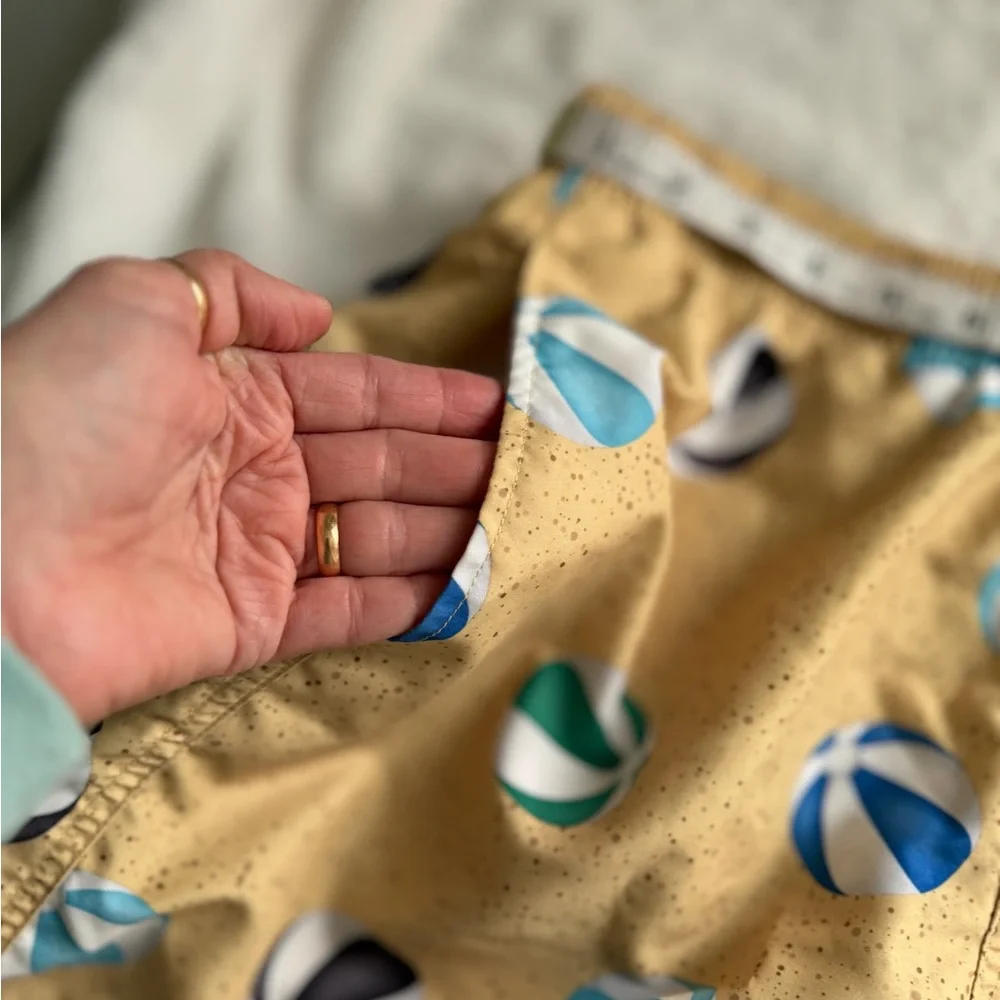 Stylish Tan Swim Trunks with Beach Ball Design